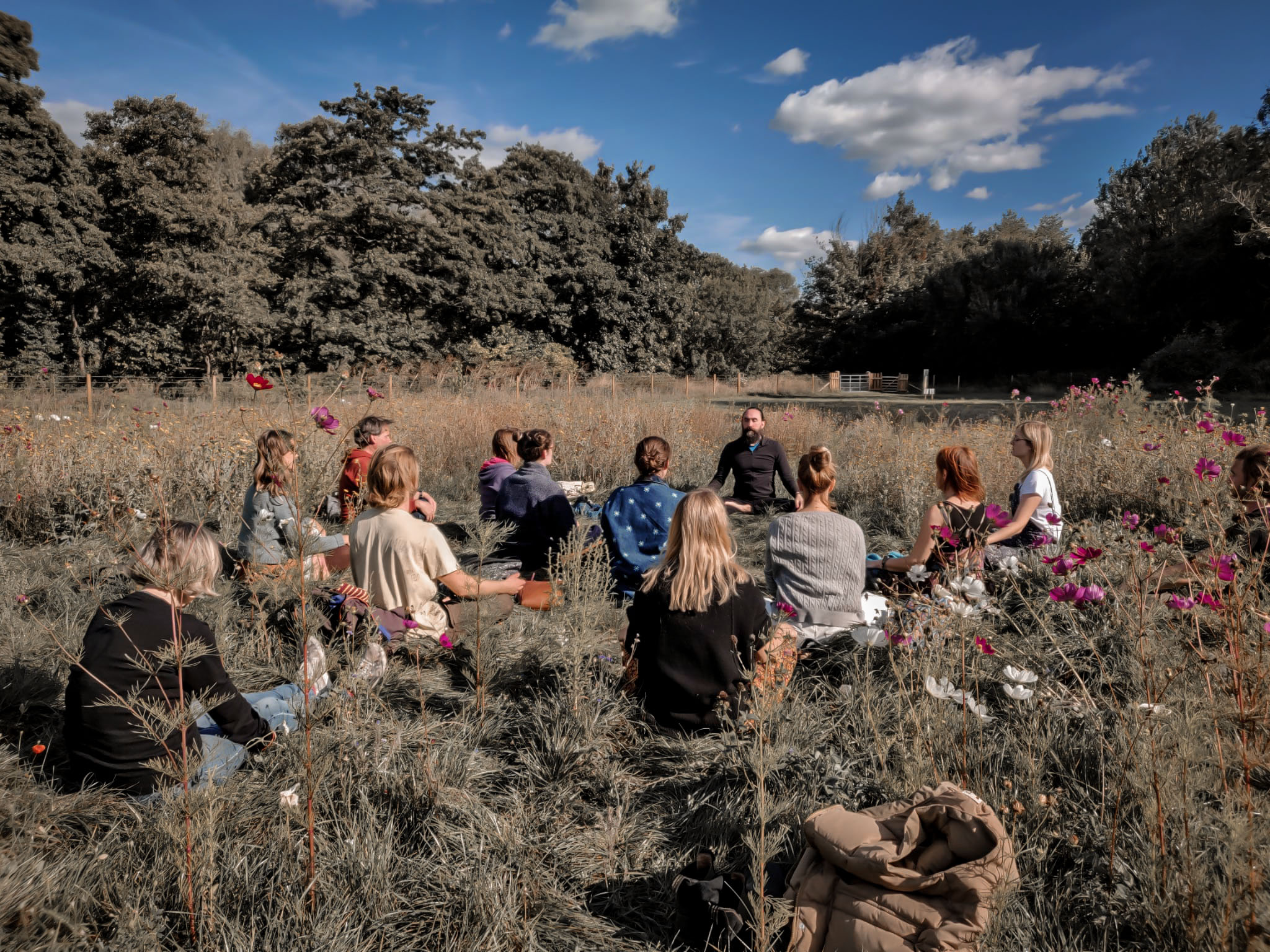 An outdoor breathwork circle held at Well Bath.